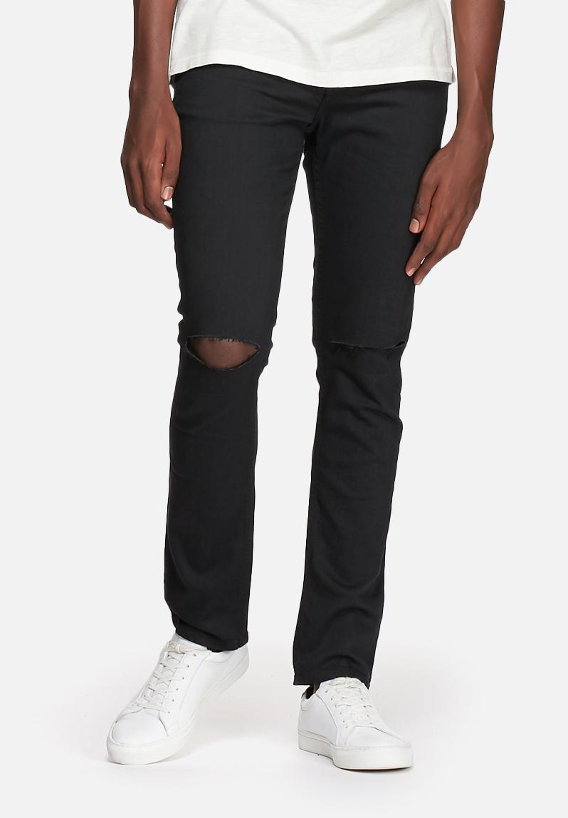 knee cut black jeans